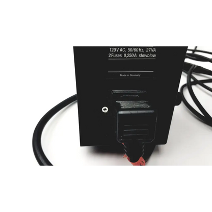 Black heine omega 180 ophthalmoscope wired battery supply with specifications printed on the back panel