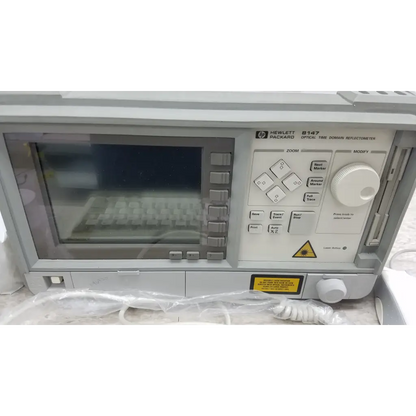 Gray hewlett packard 8147 optical time domain reflectometer with digital display and control panel with case and accessories