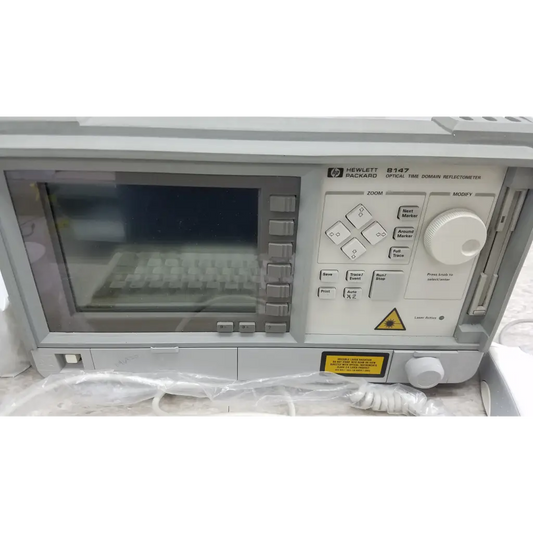 Gray hewlett packard 8147 optical time domain reflectometer with digital display and control panel with case and accessories