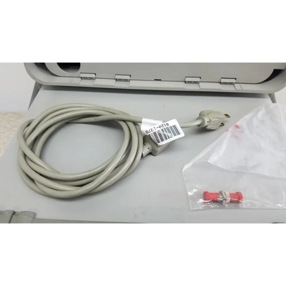 Coiled beige power cord with three-prong plug and barcode for hewlett packard 8147 optical time domain reflectometer accessories