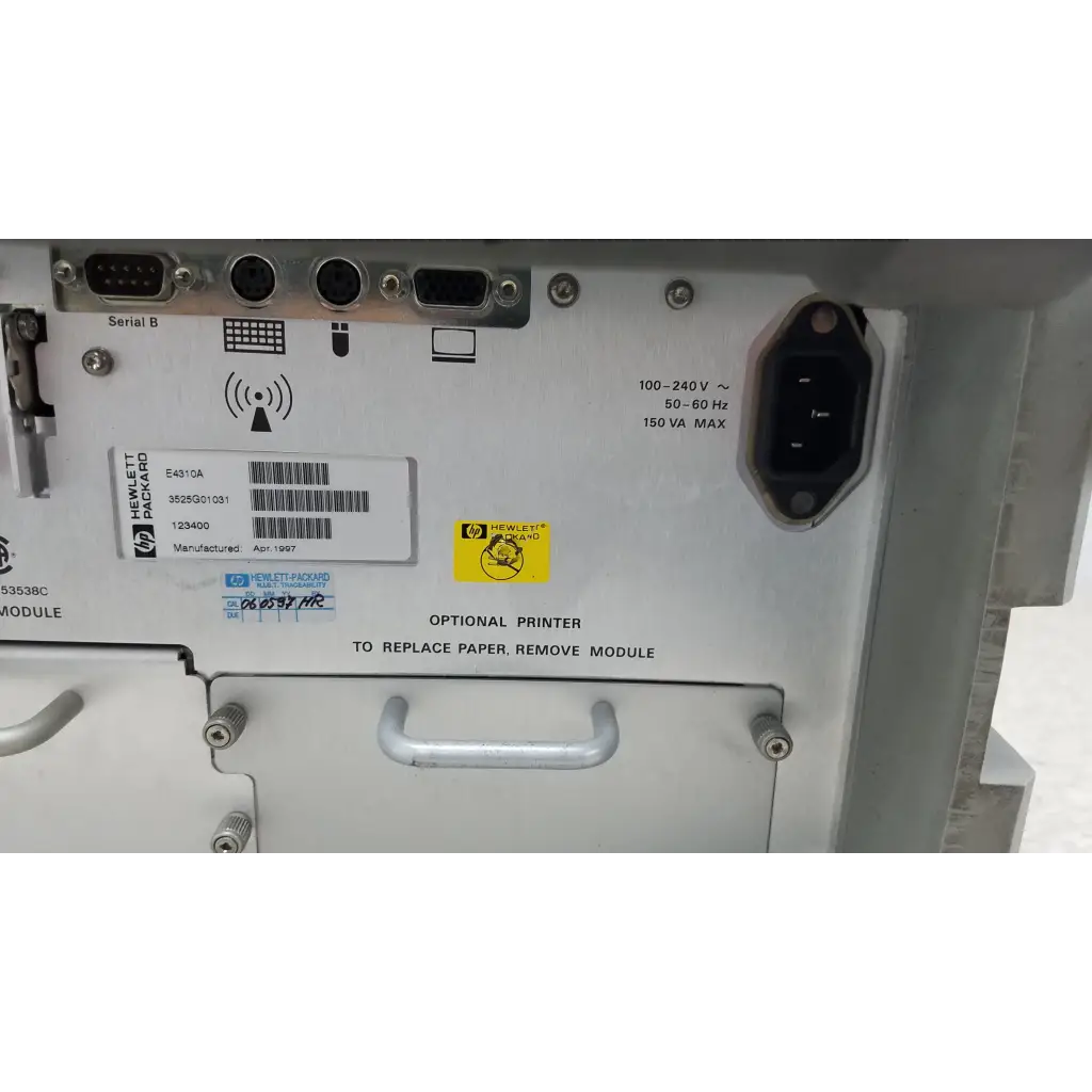 White hewlett packard 8147 time domain reflectometer back panel with silver metal handle and multiple ports visible