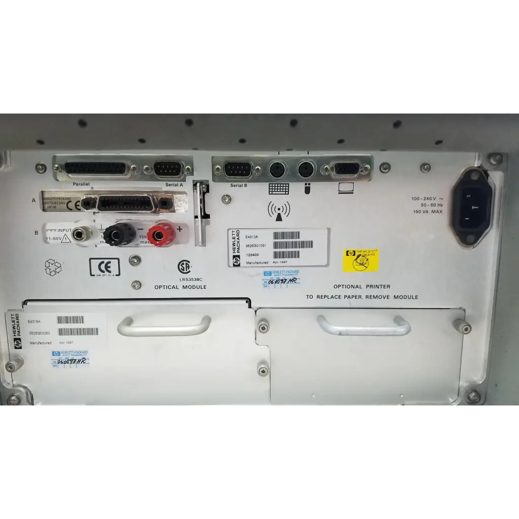 Back panel of white hewlett packard 8147 optical time domain reflectometer with various ports and labels