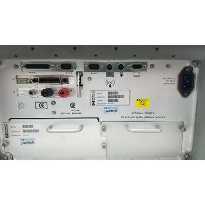Back panel of white hewlett packard 8147 optical time domain reflectometer with various ports and labels