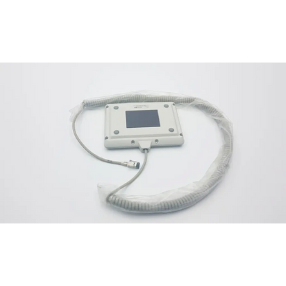 Gray rectangular hewlett packard m1106c patient monitor keyboard with touchscreen and coiled usb cable wrapped in plastic
