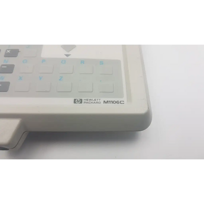 Off-white hewlett packard m1106c patient monitor keyboard with light blue lettering for packard m1106c patient use