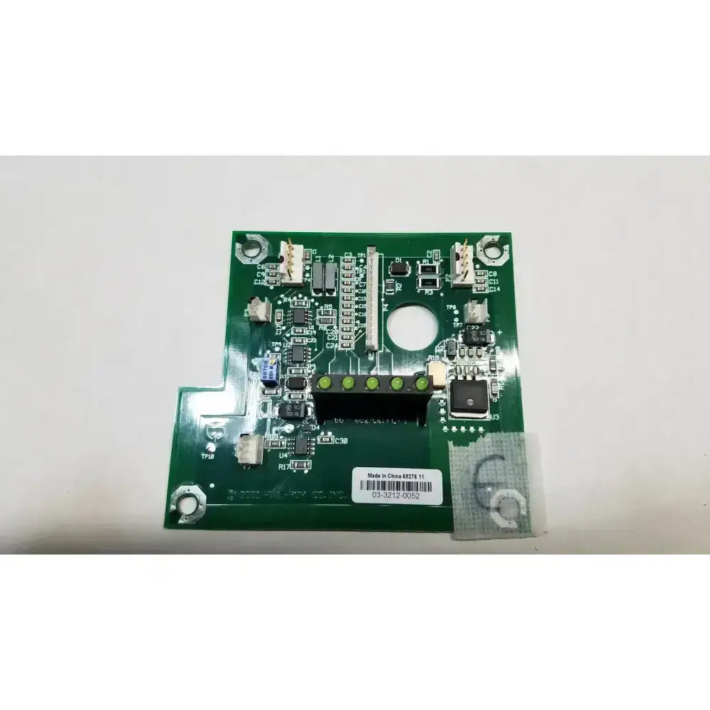 Green printed circuit board with electronic components and white label for hill-rom light relay control mother board
