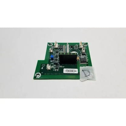 Green printed circuit board with electronic components and white label for hill-rom 2001 light relay control mother board