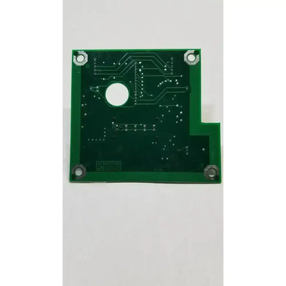 Green hill-rom 2001 light relay control mother board with white conductive traces and silver mounting holes