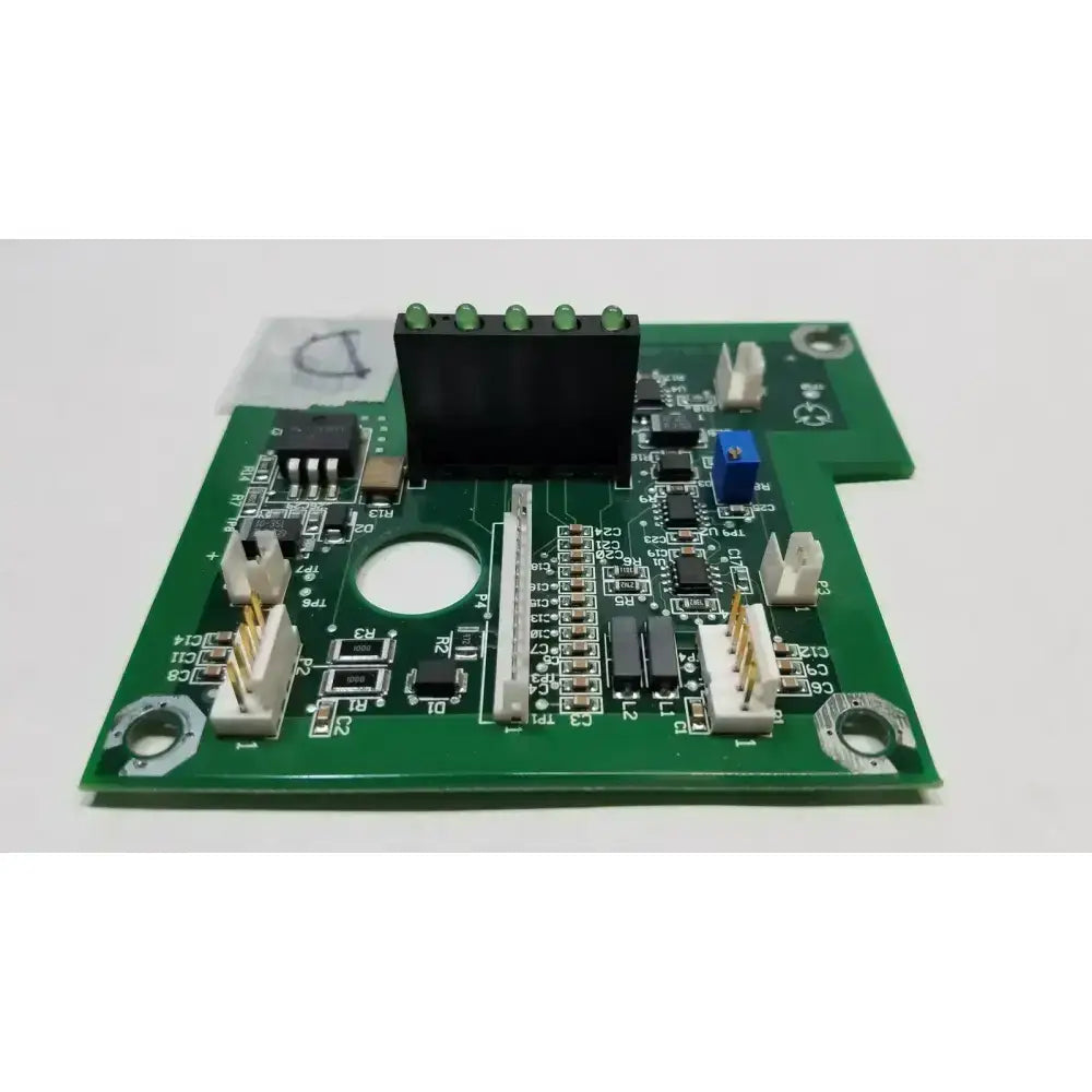 Green printed circuit board of hill-rom 2001 relay control mother board with black white components and circular cutout