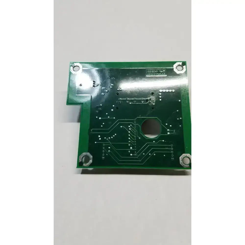 Green hill-rom 2001 relay control mother board with silver solder pads and four mounting holes for light relay control