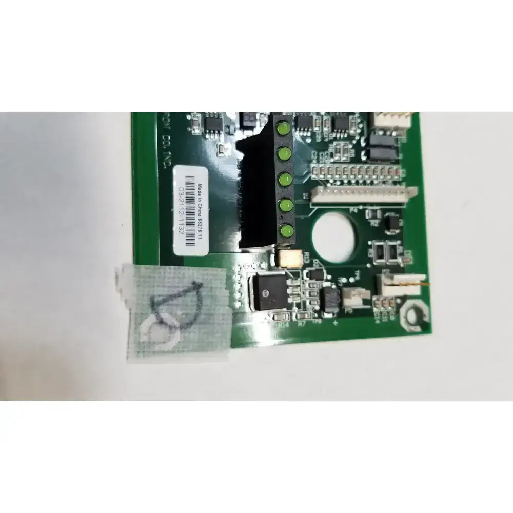 Green printed circuit board with black components and white label for hill-rom 2001 light relay control mother board