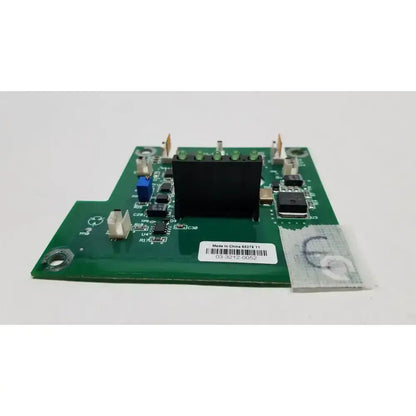 Green printed circuit board of hill-rom light relay control mother board with black component and blue capacitors