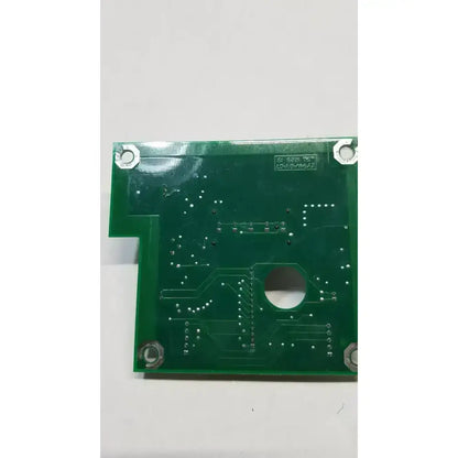 Green rectangular printed circuit board with silver mounting holes and circular cutout for hill-rom light relay control mother board
