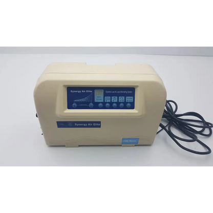 Cream-colored hill-rom mdq-79r0 synergy air elite air mattress pump with blue digital display and control buttons