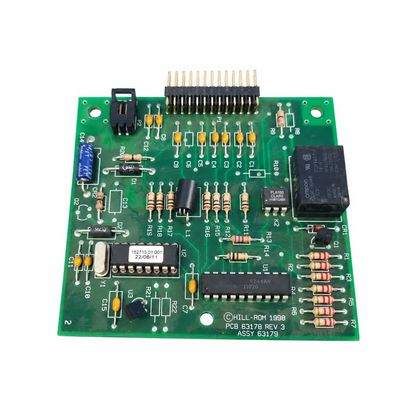 Green printed circuit board with resistors capacitors and integrated circuits hill rom total care control board assembly