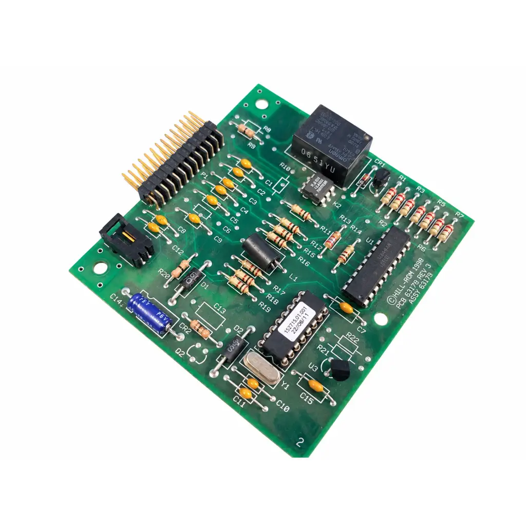 Green printed circuit board with resistors capacitors integrated circuits and black relay for hill rom total care control board assembly