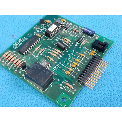 Green printed circuit board with black integrated circuits and connectors for hill rom total care control board assembly