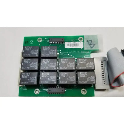 Green omron relay control board with black rectangular relays for hill rom total care ent light control board