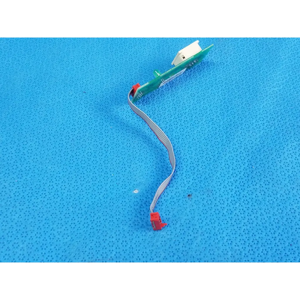 Hill-rom totalcare nurse call button pcb switch assembly with green board red connectors and gray ribbon cable