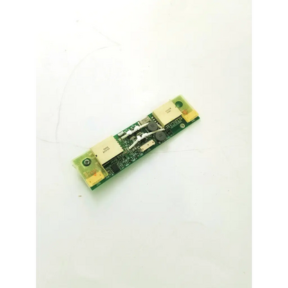 Green hitachi vnr10c209-inv inverter board with beige rectangular components and white capacitors on circuit board