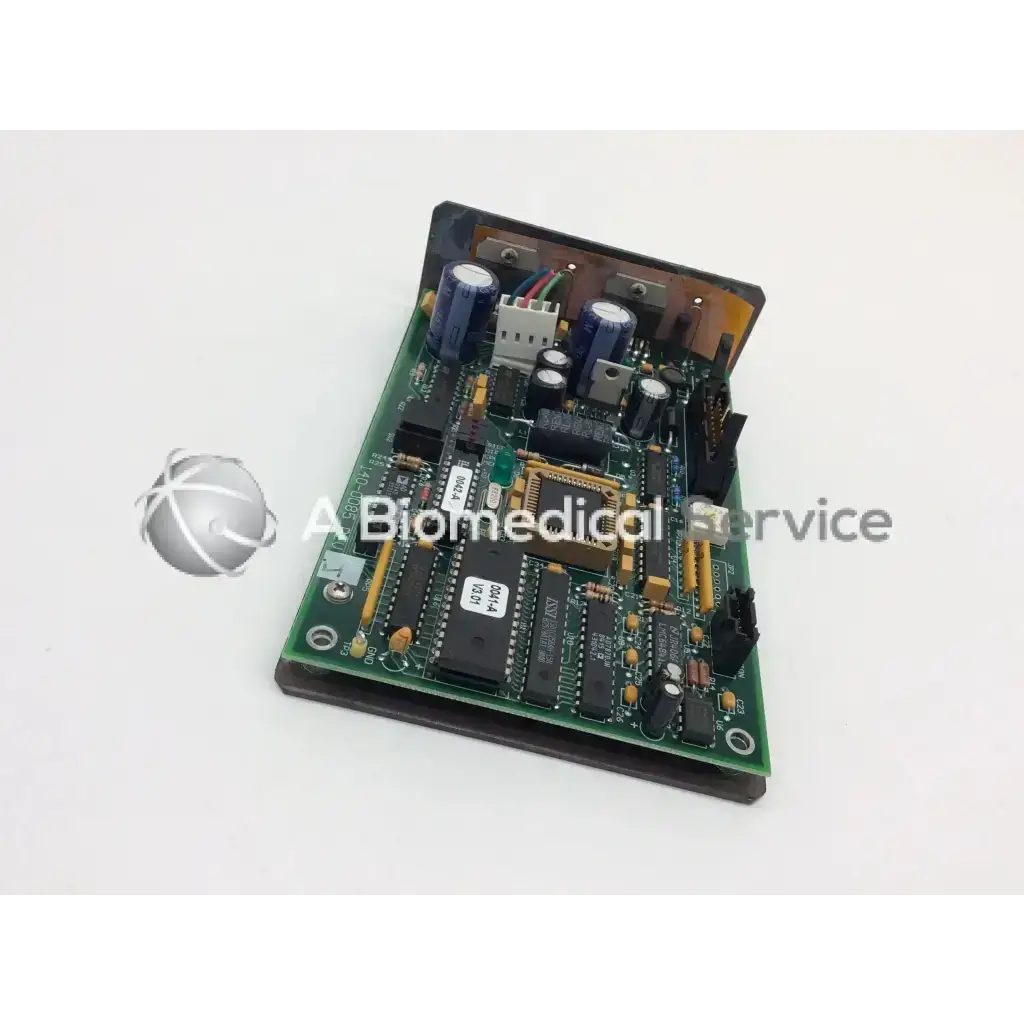 Green printed circuit board with blue capacitors black integrated circuits and gold connectors for hologic qdr explorer motor control board