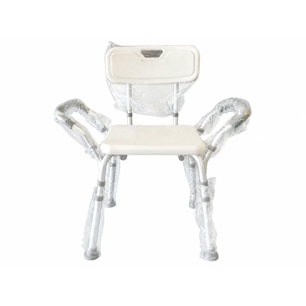 White plastic shower chair with silver metal frame biomed certified padded armrests still wrapped in protective plastic