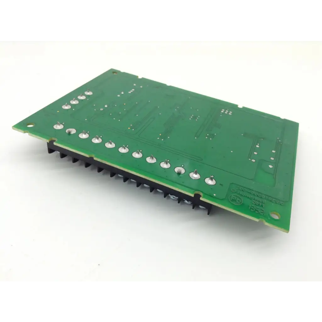 Green rectangular sa4208sn-1 alarm universal expander board with silver solder pads and black heat sinks along one edge