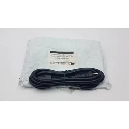 Hospital grade green dot power cord cable 5-15p to c13 18awg black coiled cord packaged in clear plastic