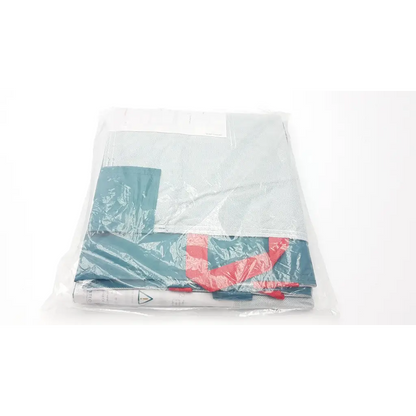 Teal and red patterned fabric lateral transfer air mattress wrapped in clear plastic for single-patient use