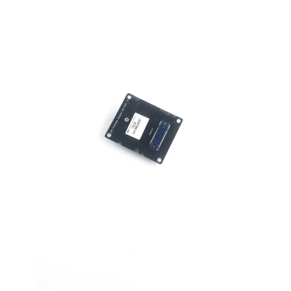 Black rectangular hp 34p interface adaptor with white label and blue connector port for electronic connectivity