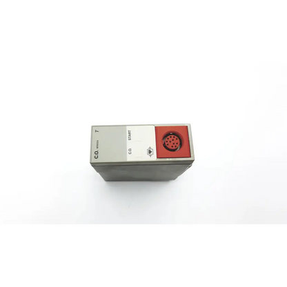 Gray rectangular m1012a cardiac output module with red circular connector and labeled control buttons for cardiac output use
