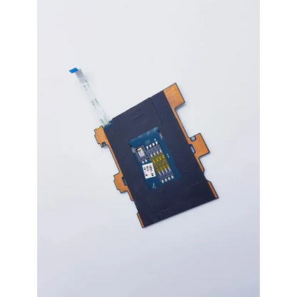 Black rectangular electronic module with gold circuitry and blue ribbon cable for elitebook 8470p laptop smart card reader