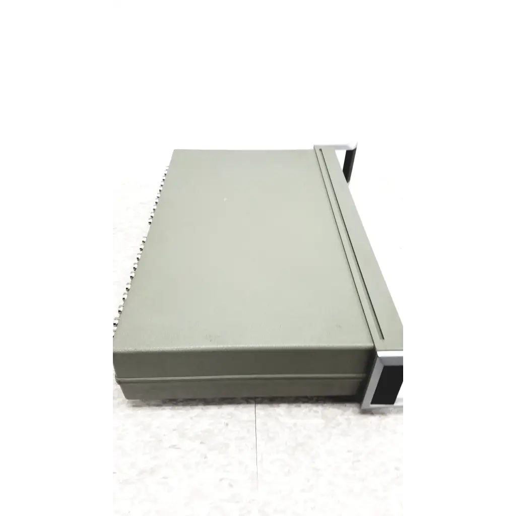 Gray metal hewlett packard 3488a switch control unit with side ports and black handle for switch control tasks