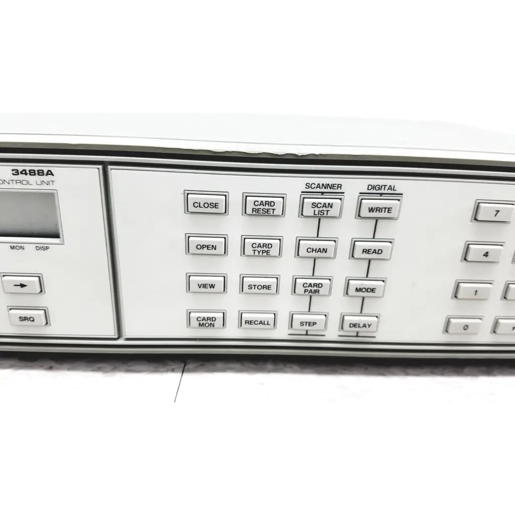 White hewlett packard 3488a switch control unit with labeled button grid and small display screen for switch control use