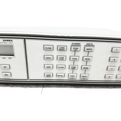 White hewlett packard 3488a switch control unit with labeled button grid and small display screen for switch control use