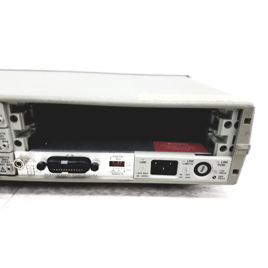 Gray metallic rack-mountable hewlett packard 3488a switch control unit power supply with labeled ports and red fuse indicator