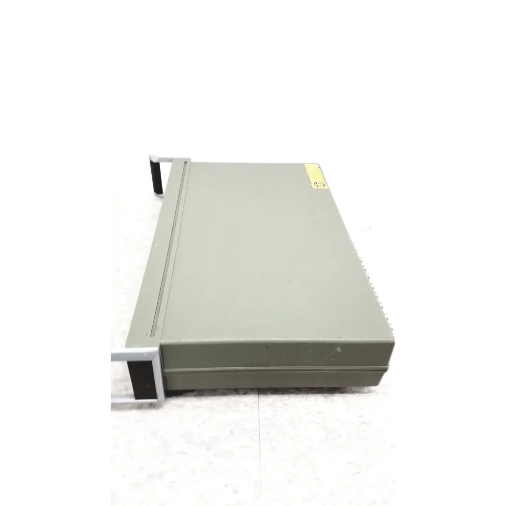 Gray metal hp hewlett packard 3488a switch control unit chassis with black handles and yellow warning label