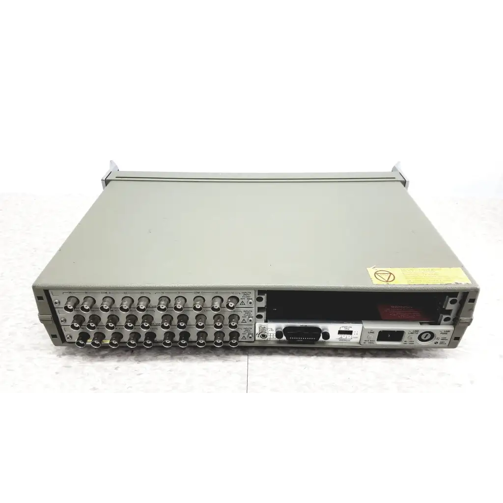 Gray metallic hewlett packard 3488a switch control unit with bnc connectors and front panel ports indicator lights