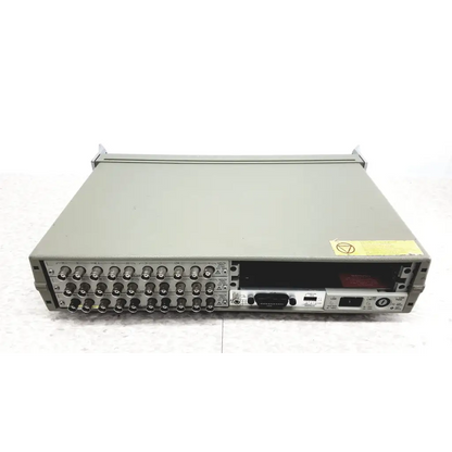 Gray metallic hewlett packard 3488a switch control unit with bnc connectors and front panel ports indicator lights