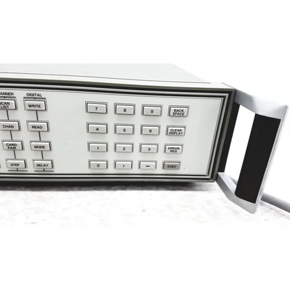 White rectangular Hewlett Packard 3488A switch control unit with numeric keypad and black handle for switch control tasks