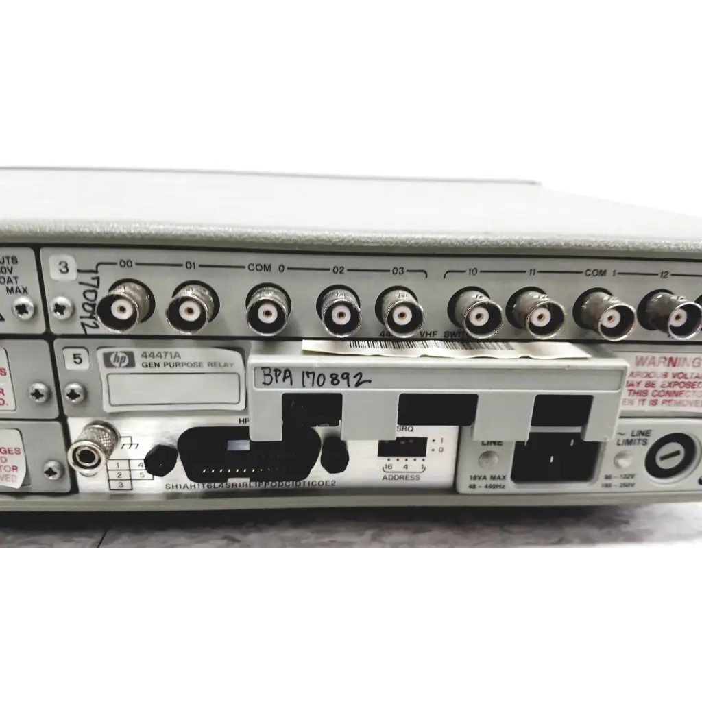 Back view of silver hp 44471a general-purpose relay with bnc connectors and black power port in hewlett packard 3488a switch control unit