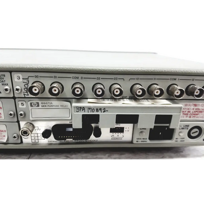 Back view of silver hp 44471a general-purpose relay with bnc connectors and black power port in hewlett packard 3488a switch control unit