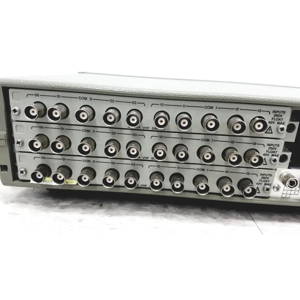 Gray metal hewlett packard 3488a switch control unit back with multiple bnc connectors and labeled input channels