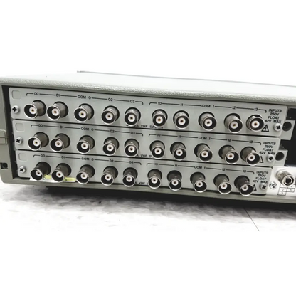 Gray metal hewlett packard 3488a switch control unit back with multiple bnc connectors and labeled input channels