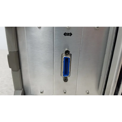Blue hp-ib connector mounted on a silver panel on the back of a hewlett packard 4284a precision lcr meter