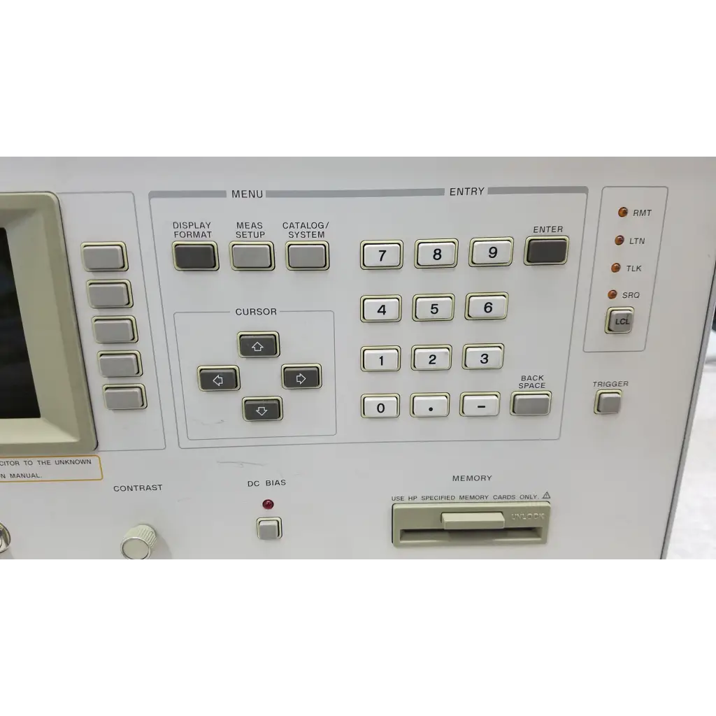 White hp hewlett packard 4284a precision lcr meter control panel with gray buttons and small screen
