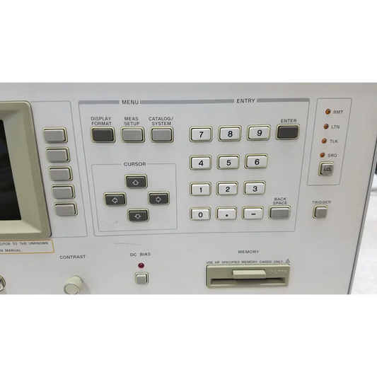 White hp hewlett packard 4284a precision lcr meter control panel with gray buttons and small screen
