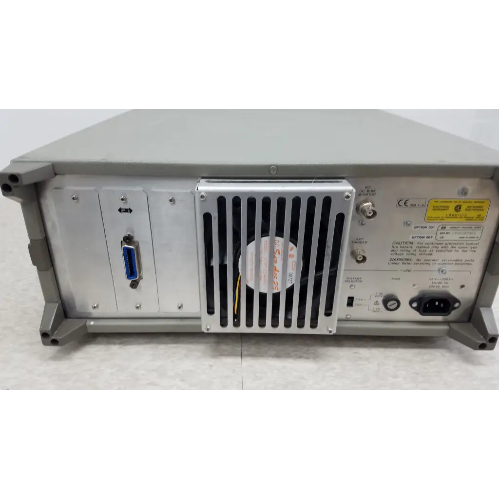 Gray metal rack-mountable hewlett packard 4284A precision lcr meter back with blue db-25 connector and ventilation grille