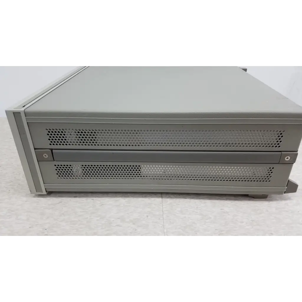 Gray metal server rack with perforated front panels and two drawers for hewlett packard precision lcr meter 4284a