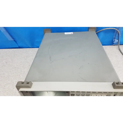 Gray metallic Hewlett Packard 8920A communications test set with beige trim and label for rf communications testing